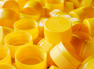 yellow plastic bottle caps.Recycling collection and production processing plastic bottle caps...