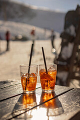 Children and adults, happy family in winter clothing at ski vacation, skiing, winter