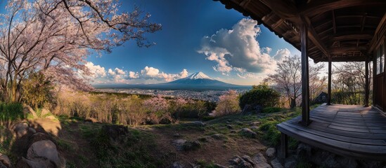 Mount Fuji framed by cherry blossoms and traditional Japanese architecture