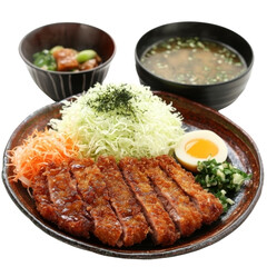 Delicious Japanese katsu meal featuring crispy pork cutlet, fresh cabbage, and soft boiled egg, served with miso soup and pickled vegetables, perfect for satisfying lunch
