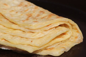 A close-up of the traditional Moroccan flatbread known as Msemmen or Msemen