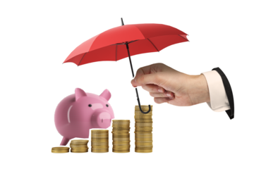 Hand holding red umbrella over stacked gold coins and piggy bank on white background. Concept of financial security, savings, and investment protection