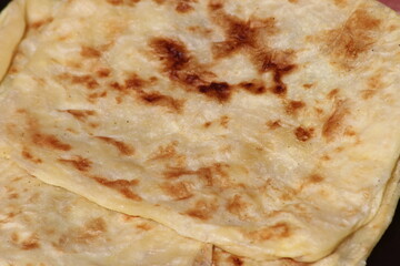 A close-up of the traditional Moroccan flatbread known as Msemmen or Msemen