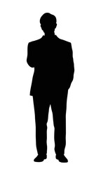 Silhouette of a thoughtful man standing in a contemplative pose, dressed in a formal suit