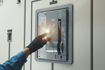 Naklejka premium Electrical equipment maintenance service engineer Engineers carry AC voltmeters to check voltage at breaker terminals and inspect switchgear.