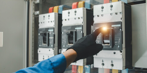 Electrical equipment maintenance service engineer Engineers carry AC voltmeters to check voltage at...