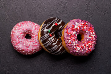 An eye-catching arrangement of colorful macarons on a dark background