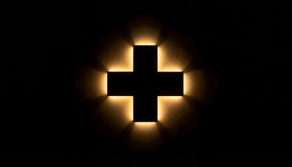 Gold and black medical cross illuminated on dark background, luxury healthcare