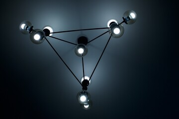 evening dance of light by artificial lighting lamps in the room
