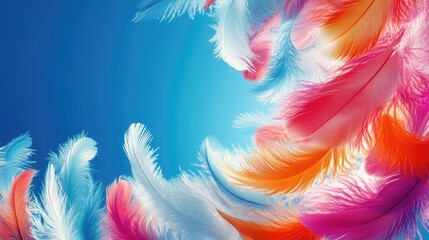 Obraz premium Bright multi-colored feathers against a light blue sky.