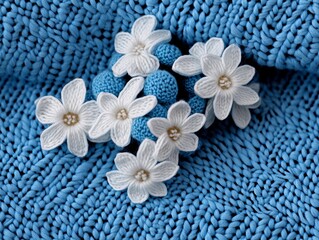 A bunch of white flowers sitting on top of a blue blanket