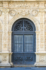 Metalwork entrance door. Architectural features of the medieval Seville Cathedral, Spain. Part of a series