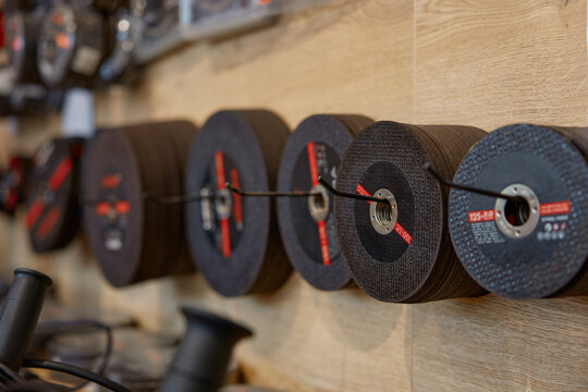 Hardware store display with abrasive cutting wheels for grinding machine