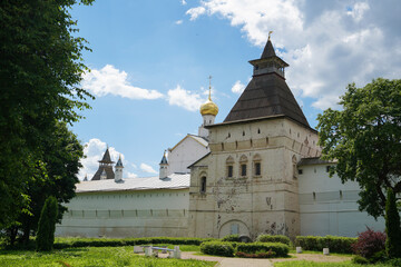 Russia, Rostov the Great, June 14, 2021: View of the walls and the tower of the Rostov Kremlin State Museum-Reserve on a sunny summer day. The pearl of the Golden Ring of Russia. High-quality photo