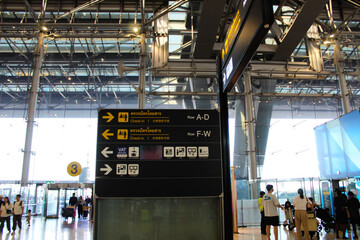 A collection of high-quality photographs showcasing airport signage, guiding travelers through check-in, departures, and terminal services. Ideal for travel, transportation, and infrastructure-related