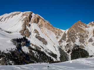 dolomites fanes pass mountain in winter snow season sunny day