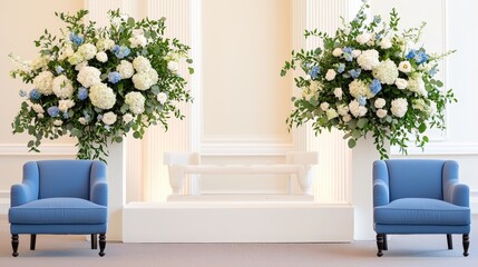 Elegant floral arrangements in large vases flank two blue chairs against a light backdrop, creating a serene and inviting atmosphere.