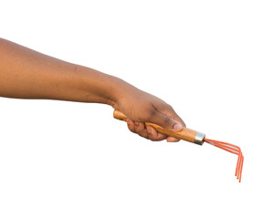 hand holding a metalic rake for gardening, transparency png