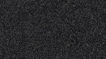 Fototapeta premium Abstract black background with textured specks