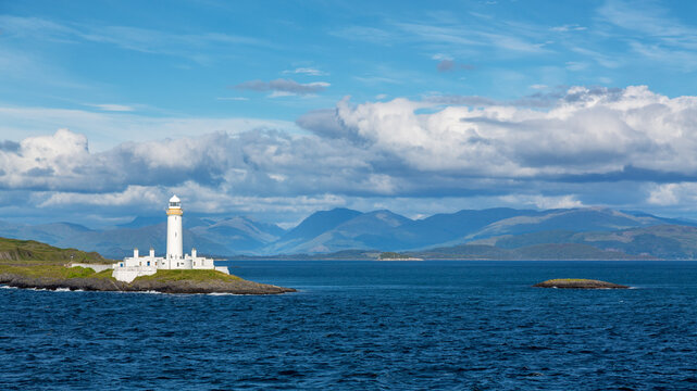 Panoramic view of the Lismore Lighthouse, Eilean Musdile, Inner Hebrides. The lighthouse can be seen at the entrance to Loch Linnhe from the Oban to Mull ferry.