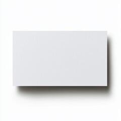 Fototapeta premium White paper sheet on white background, ideal for blank canvas or layout.