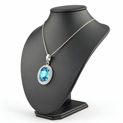 pendant with blue gem on mannequin isolated on whi