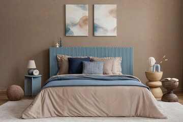 A cozy and elegant bedroom setting where layered bedding, natural materials, and abstract artwork...