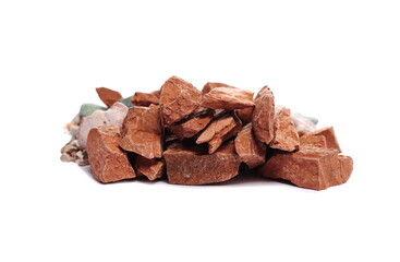 Red rocks, pile of stones isolated on white background