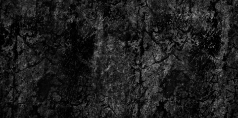 Abstract black grunge overly grain and concrete stone crack wall background. black slate stone wall background pattern with high resolution. black marble texture. black paper texture.