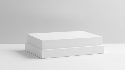 Naklejka premium A white display stands with smooth surfaces and no distractions, perfect for showcasing items with plenty of background space.