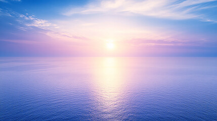 Fototapeta premium Serene sunrise over calm ocean waters, with soft pastel colors reflecting on the surface