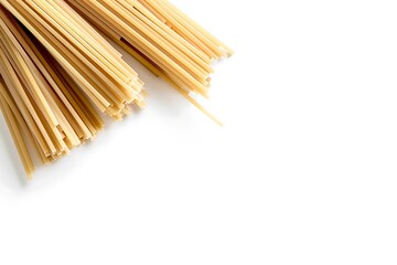 Bunch of uncooked spaghetti pasta isolated on a white background
