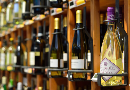 White wine bottles, Capsula Viola, Italy, September 25, 2017	