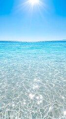 A serene seascape showcasing crystal clear water under a bright sun, perfect for vacation or relaxation themes.