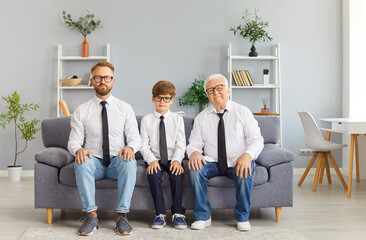 Family of three generation men portrait senior grandfather, father, son, child grandson at home...