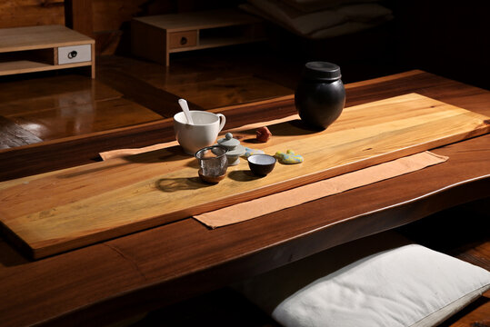 Ceramic teacups and teapot for drinking traditional tea in a traditional Korean Hanok house