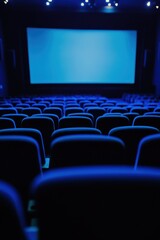 Fototapeta premium Empty cinema seats with blank screen ready for movie experience in modern theater, perfect for film industry, entertainment, and event promotion