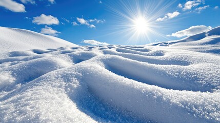 Obraz premium Sunny winter landscape, snow drifts, bright sun, clear sky, winter wonderland background