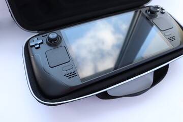 Portable game console on a white background 