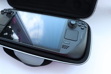 Portable game console on a white background 