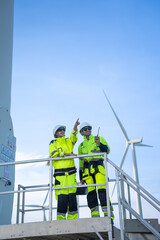 electric engineer or technician employed for inspection, maintenance, and repair of wind turbines for clean, sustainable energy and green ecological power concepts.alternative renewable wind energy 