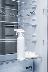 Refrigerator cleaning spray. Cleaning the refrigerator