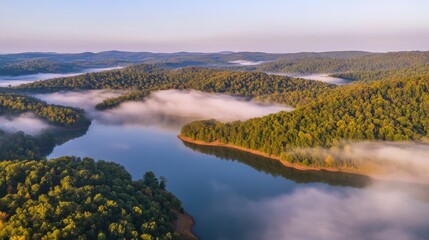 Obraz premium Majestic Misty Morning Over a Serene Lake and Lush Forests
