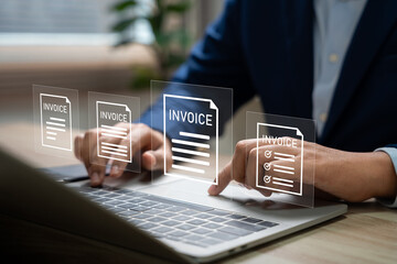 E-Invoice and Digital billing concept, Businessman using laptop to manage electronic statements on...