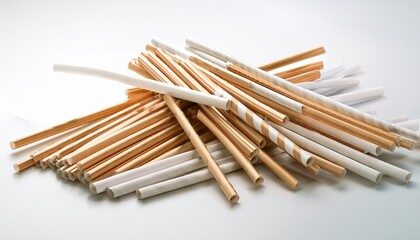 pile of paper straws on a white background