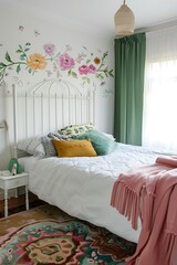 there is a bed with a white headboard and a colorful rug