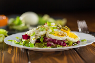 Healthy food on a plate in a plate on a wooden table