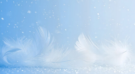 Soft white feathers floating on a light blue snowy background