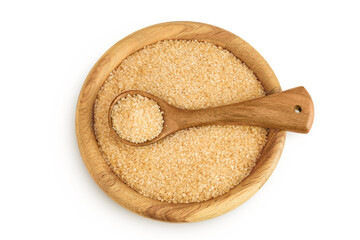 The brown sugar in wooden bowl isolated on white background. Top view. Flat lay