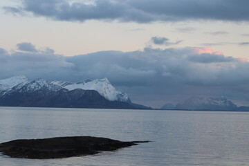 Snowy mountain peaks in early spring